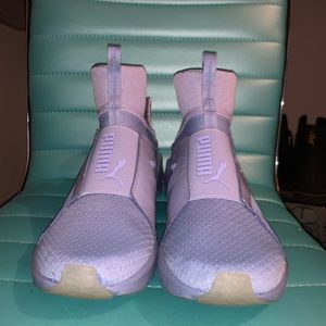Purple high top pumas